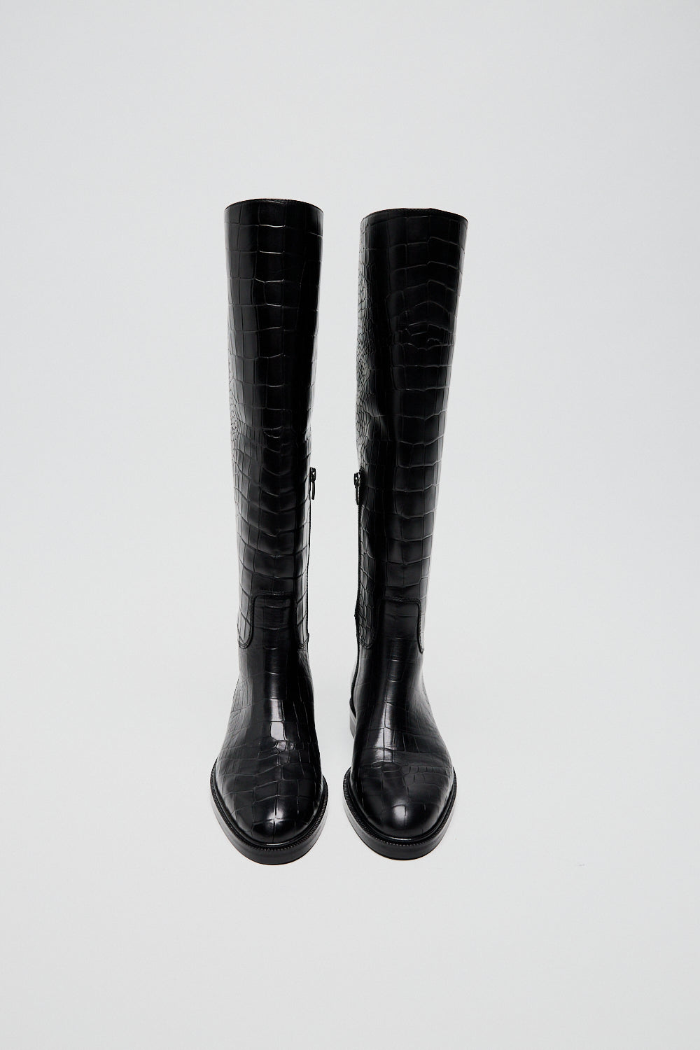 Високі чоботи